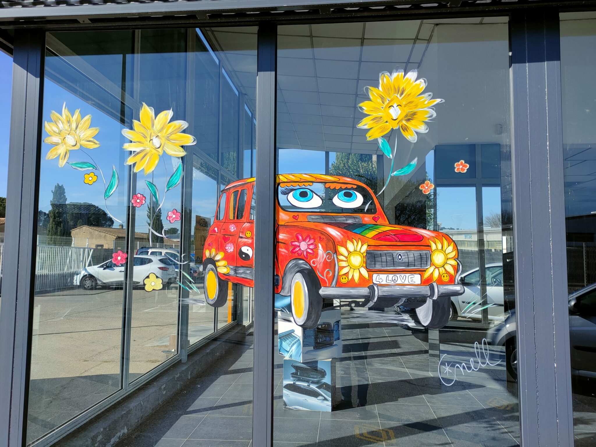 Peinture sur vitrine Renault 4L